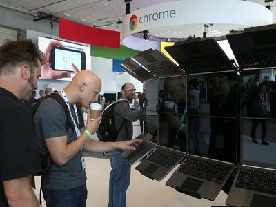 Attendees inspect a display of Google Chromebook Pixel laptops during the Google I/O developers conference at the Moscone Center on May 15, 2013 in San Francisco, California.