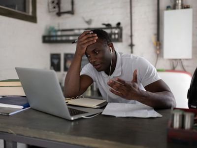 Image of man struggling with videoconferencing