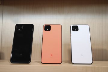 Google Pixel 4 smartphones in black, coral, and white